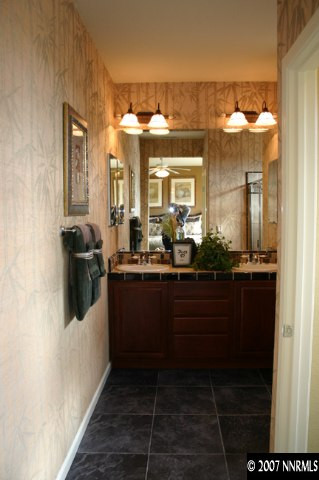 530 Seattle Slew Court Reno, NV 89521 - Photo 7 of 9 a kitchen with a sink and cabinets