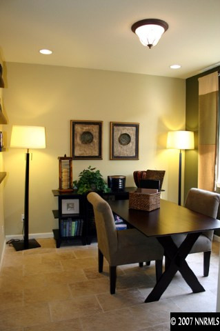 530 Seattle Slew Court Reno, NV 89521 - Photo 9 of 9 a living room with furniture a lamp and a table