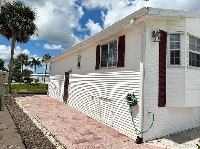554 Cattleya Refuge, Unit 554 Naples, FL 34114 - Photo 2 of 49 a view of a house with backyard