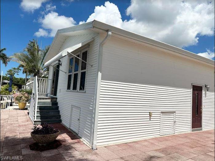 554 Cattleya Refuge, Unit 554 Naples, FL 34114 - Photo 3 of 49 a view of backyard of the house