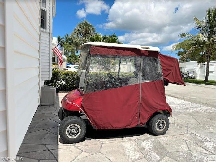 554 Cattleya Refuge, Unit 554 Naples, FL 34114 - Photo 10 of 49 a view of back yard with car parked