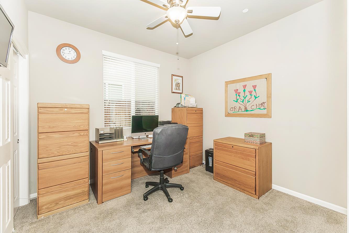 7133 North Generation Drive Fresno, CA 93711 - Photo 27 of 38 a view of a workspace with furniture and a window
