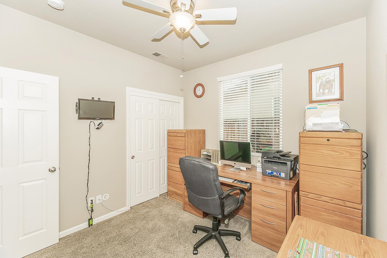 7133 North Generation Drive Fresno, CA 93711 - Photo 28 of 38 a view of a workspace with furniture and a window