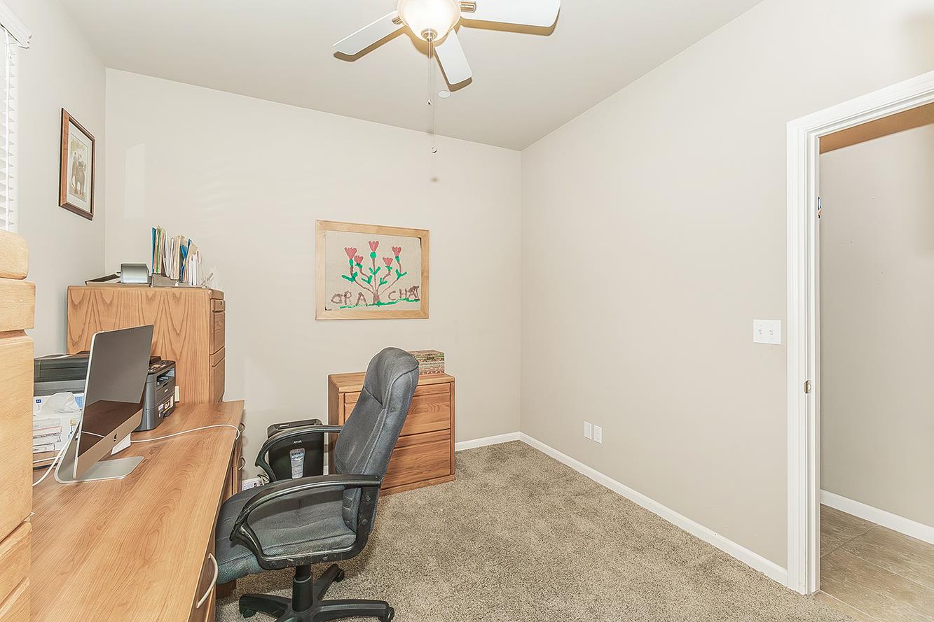 7133 North Generation Drive Fresno, CA 93711 - Photo 29 of 38 a view of a workspace with furniture and a window