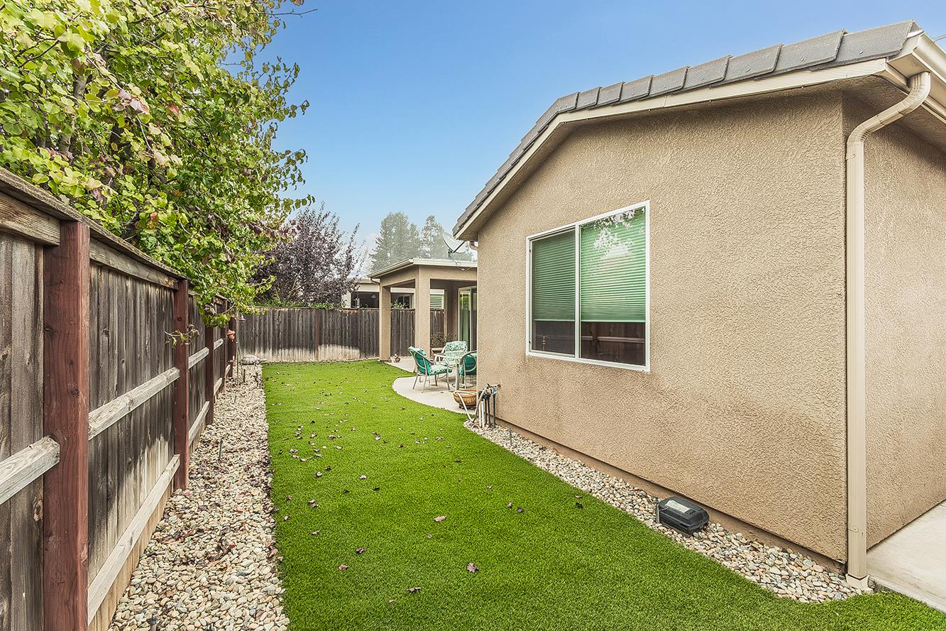 7133 North Generation Drive Fresno, CA 93711 - Photo 37 of 38 a view of an house with backyard space and balcony