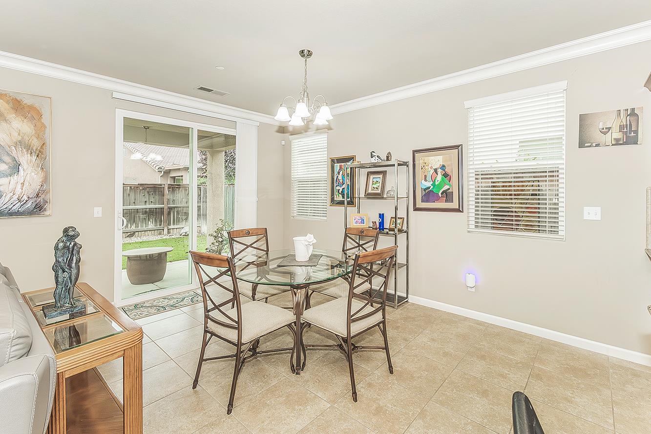 7133 North Generation Drive Fresno, CA 93711 - Photo 6 of 38 a dining room with furniture and window