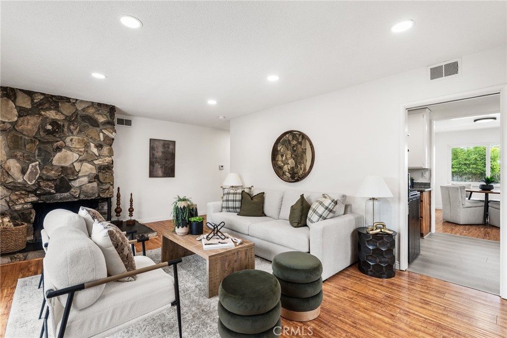 13361 Roxey Drive Garden Grove, CA 92843 - Photo 5 of 31 a living room with furniture and a wooden floor