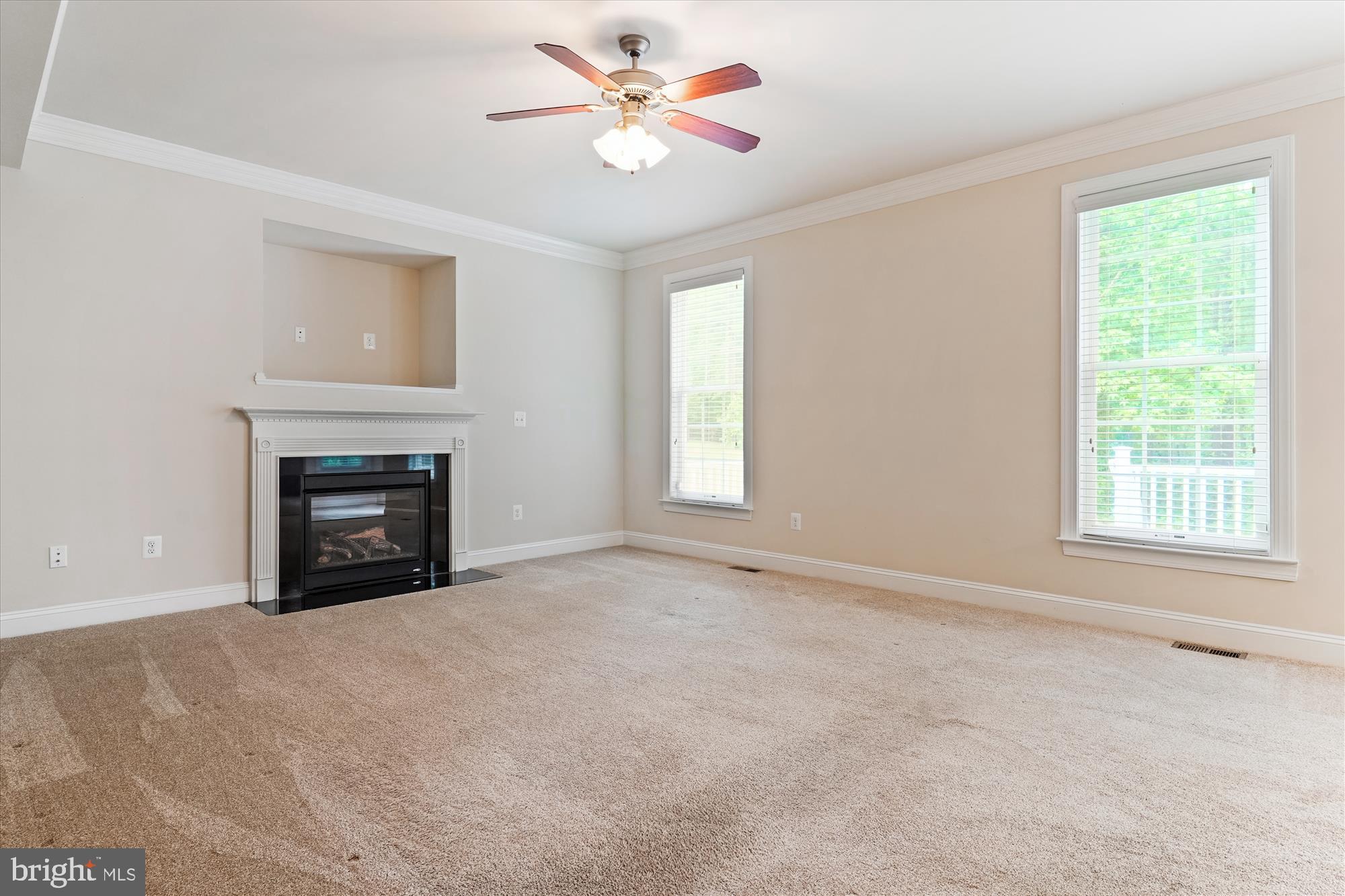 70 Ruby Glen Lane Fredericksburg, VA 22405 - Photo 19 of 72 a view of an empty room with window and fireplace