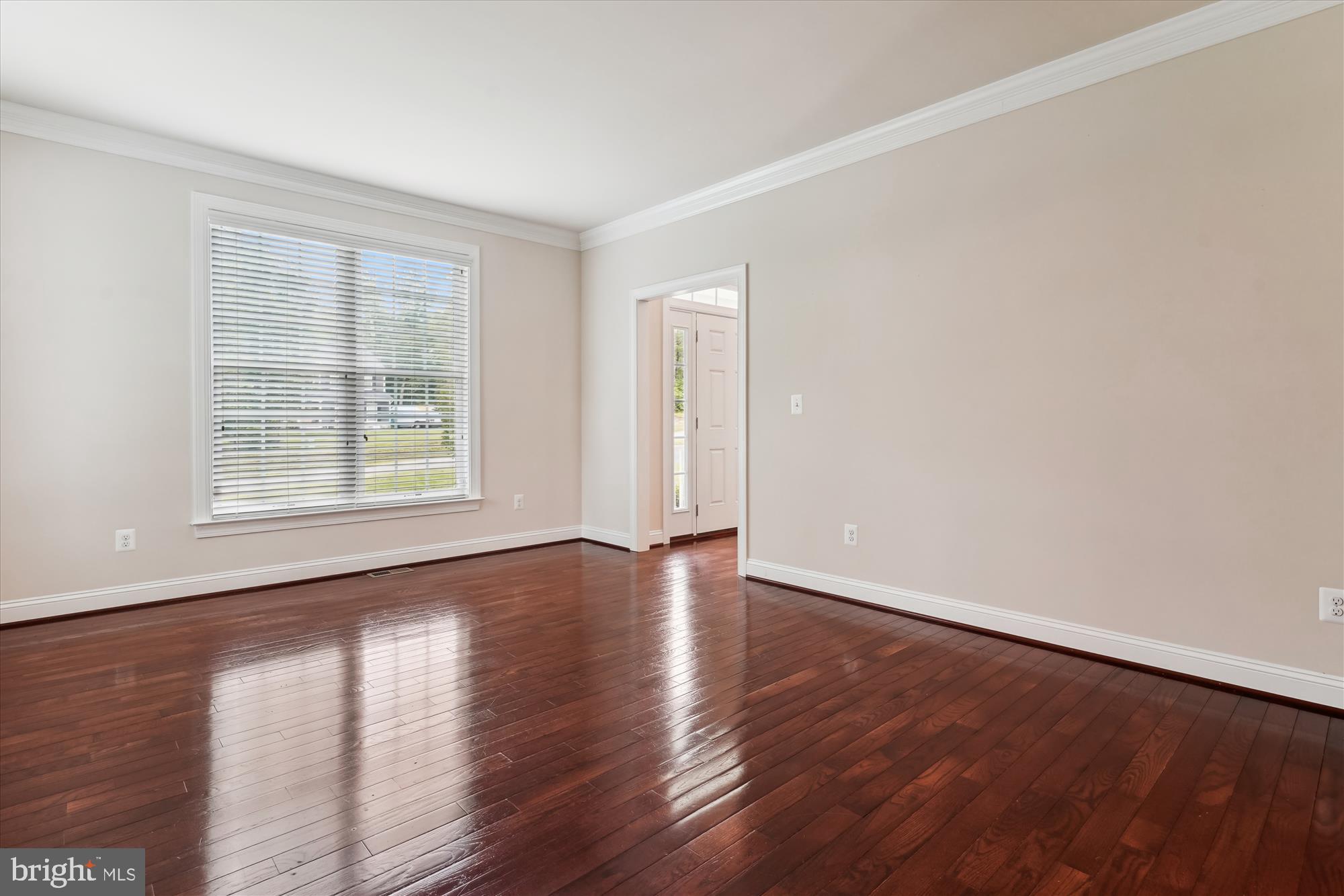 70 Ruby Glen Lane Fredericksburg, VA 22405 - Photo 22 of 72 an empty room with wooden floor and windows