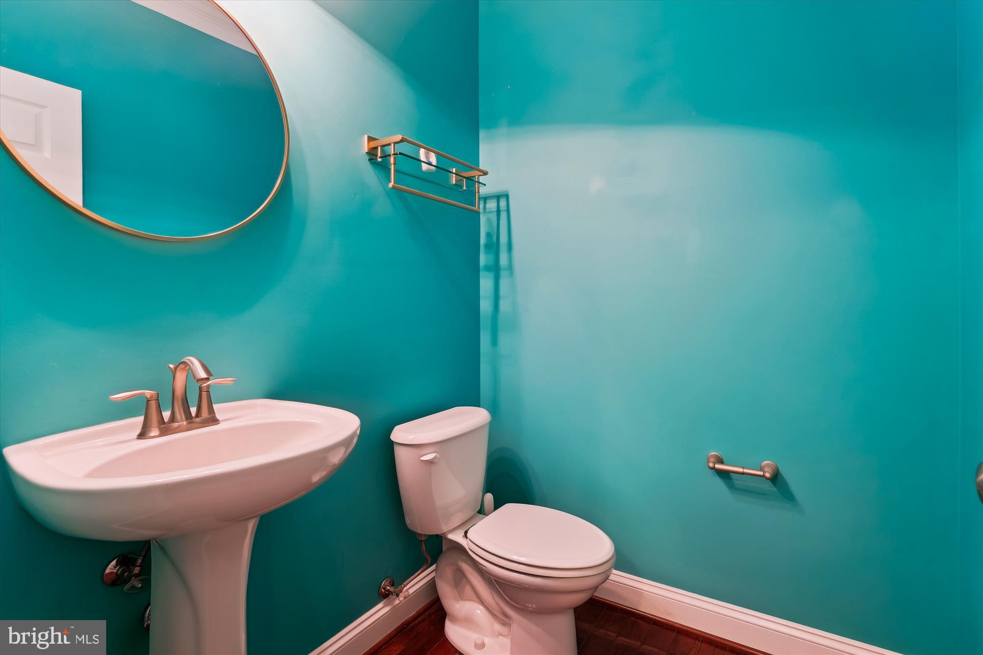 70 Ruby Glen Lane Fredericksburg, VA 22405 - Photo 26 of 72 a bathroom with a sink mirror and toilet