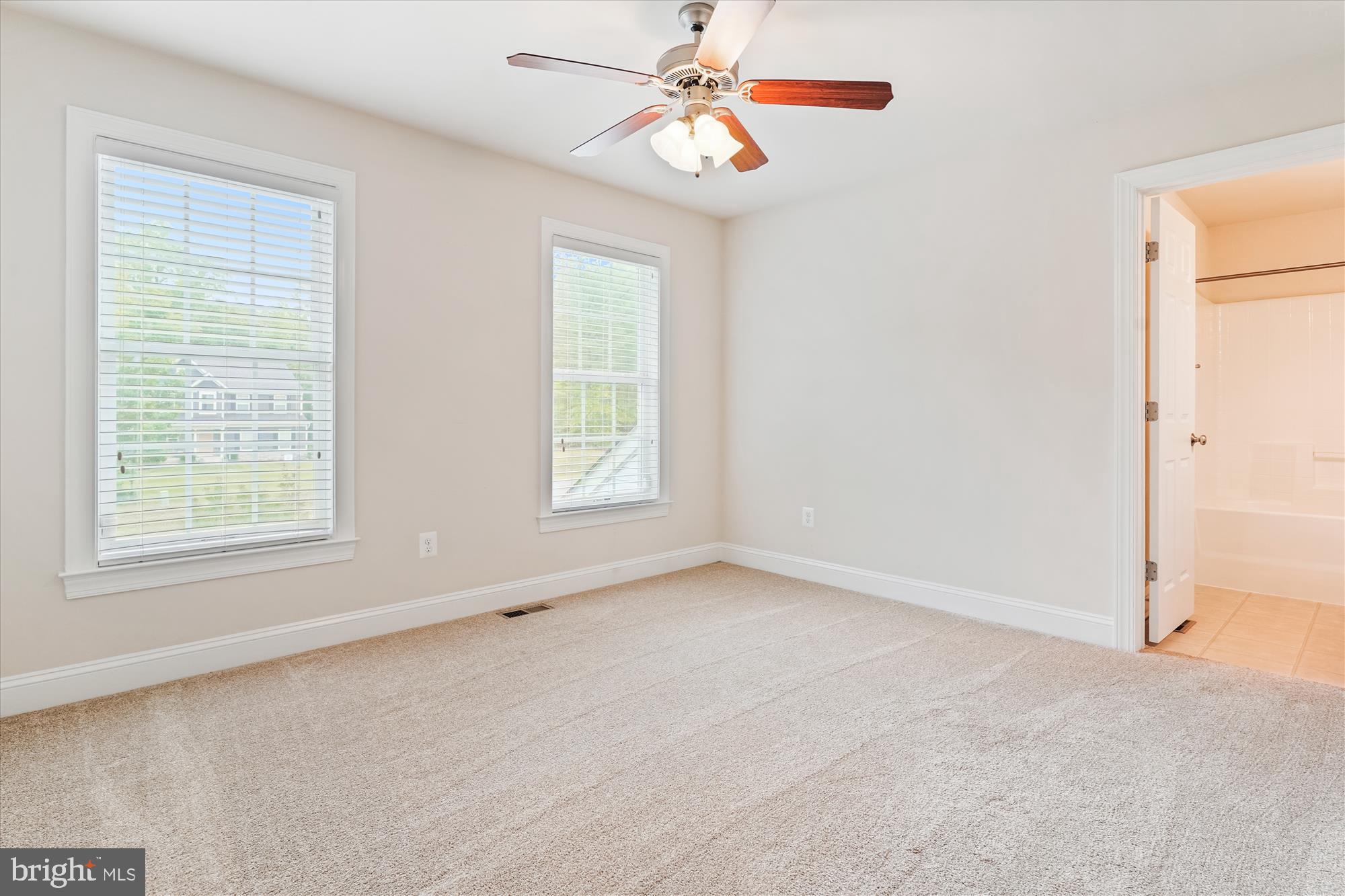 70 Ruby Glen Lane Fredericksburg, VA 22405 - Photo 37 of 72 an empty room with windows and fan