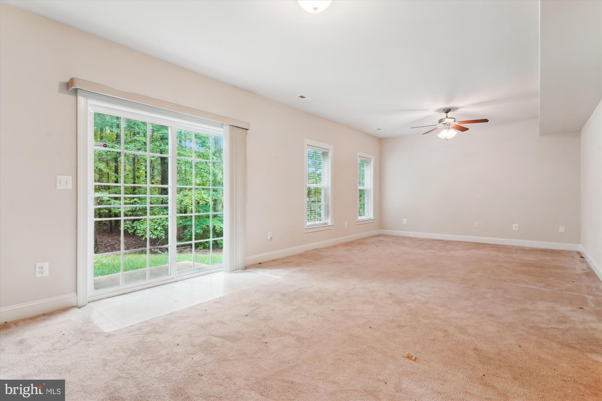 70 Ruby Glen Lane Fredericksburg, VA 22405 - Photo 54 of 72 a view of a livingroom with a ceiling fan and window
