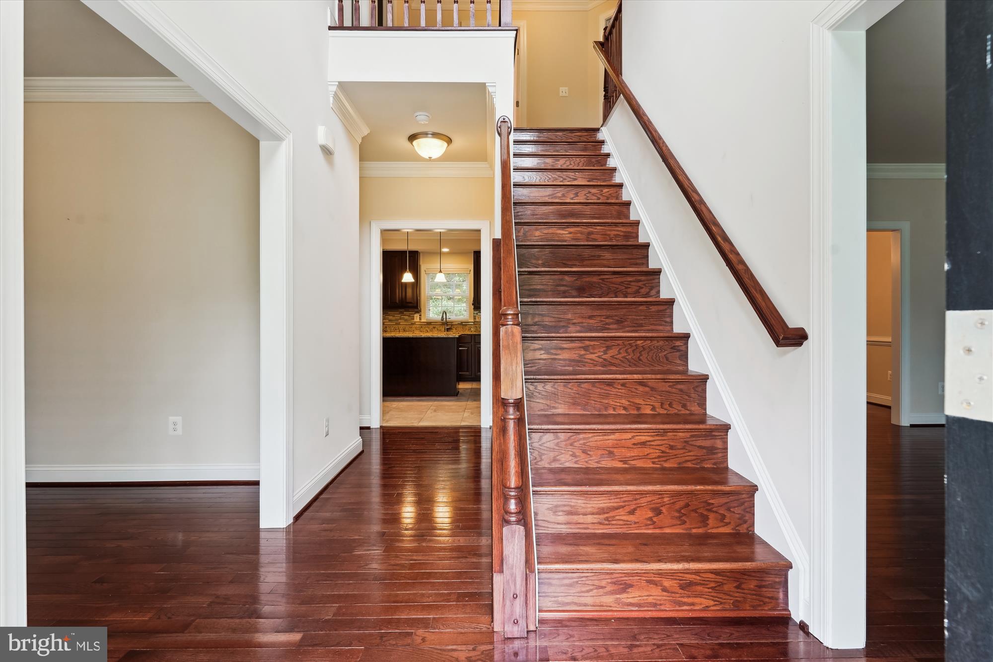 70 Ruby Glen Lane Fredericksburg, VA 22405 - Photo 5 of 72 a view of an entryway with wooden floor and staircase