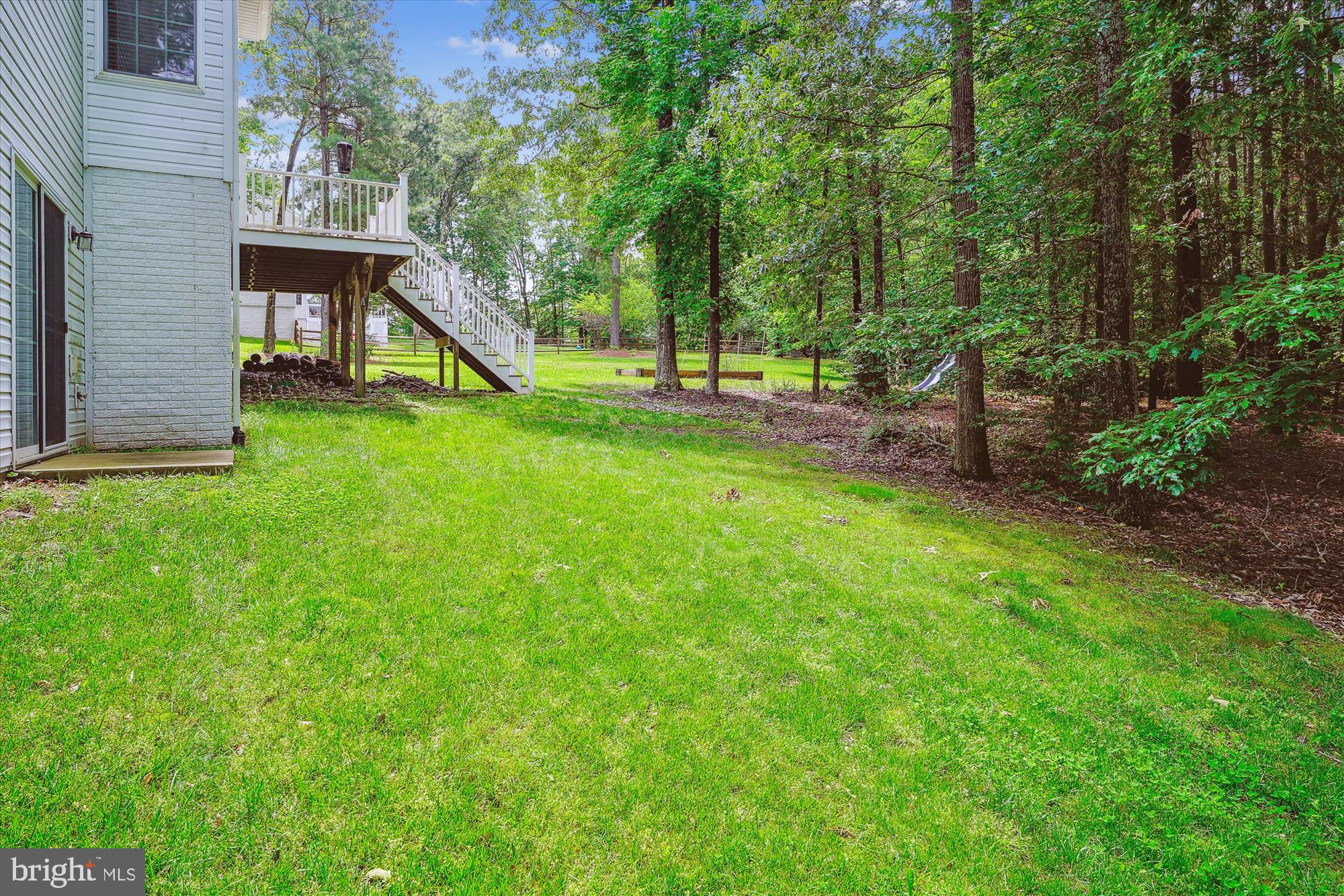70 Ruby Glen Lane Fredericksburg, VA 22405 - Photo 60 of 72 a view of a house with backyard and a tree