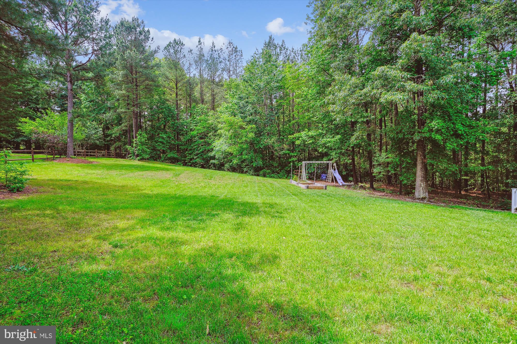 70 Ruby Glen Lane Fredericksburg, VA 22405 - Photo 61 of 72 a view of green field with trees in the background
