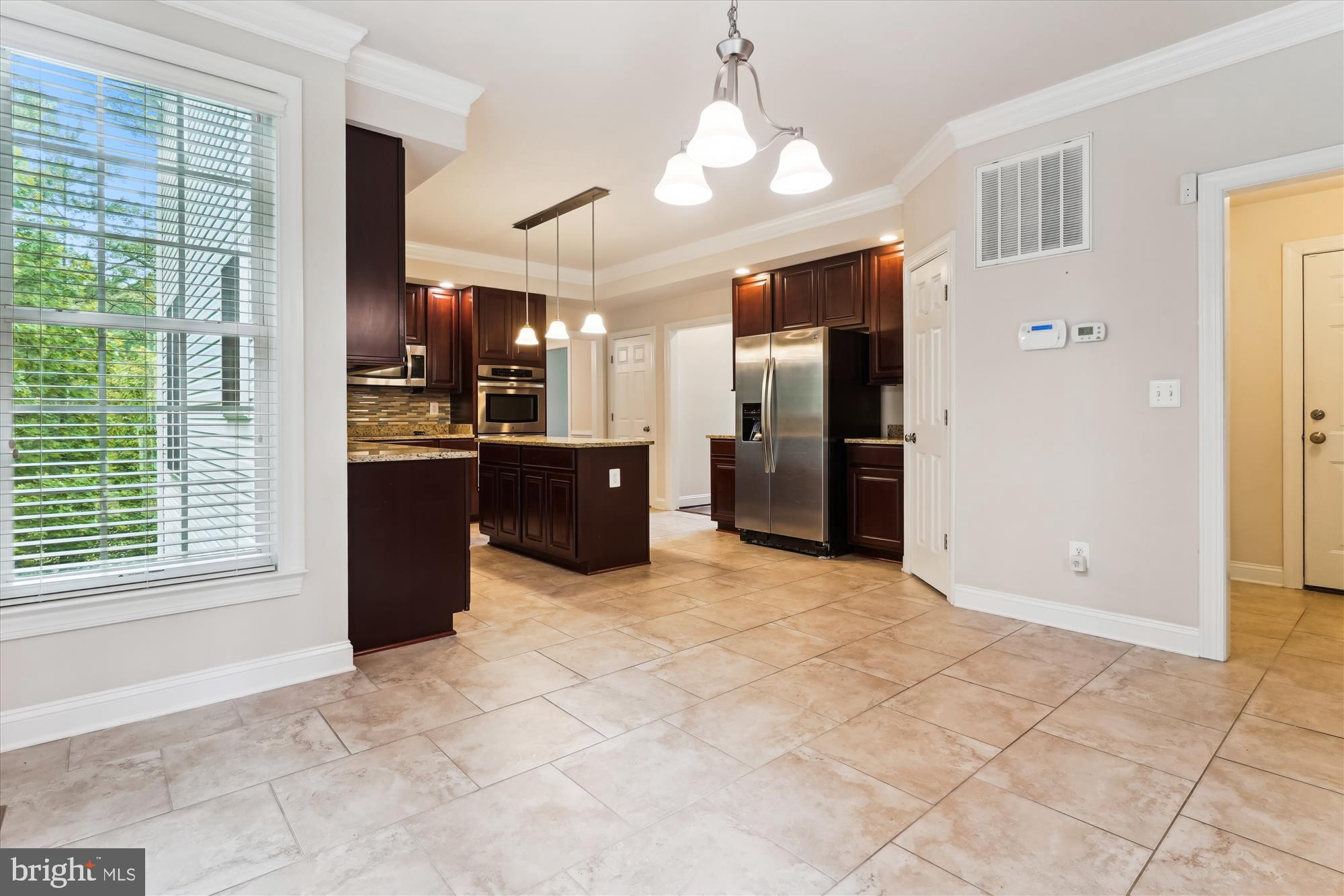 70 Ruby Glen Lane Fredericksburg, VA 22405 - Photo 6 of 72 a view of a kitchen with furniture and a kitchen