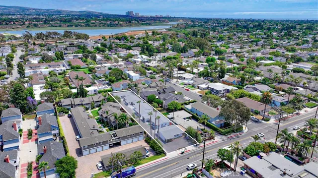 an aerial view of a city with lots of residential buildings