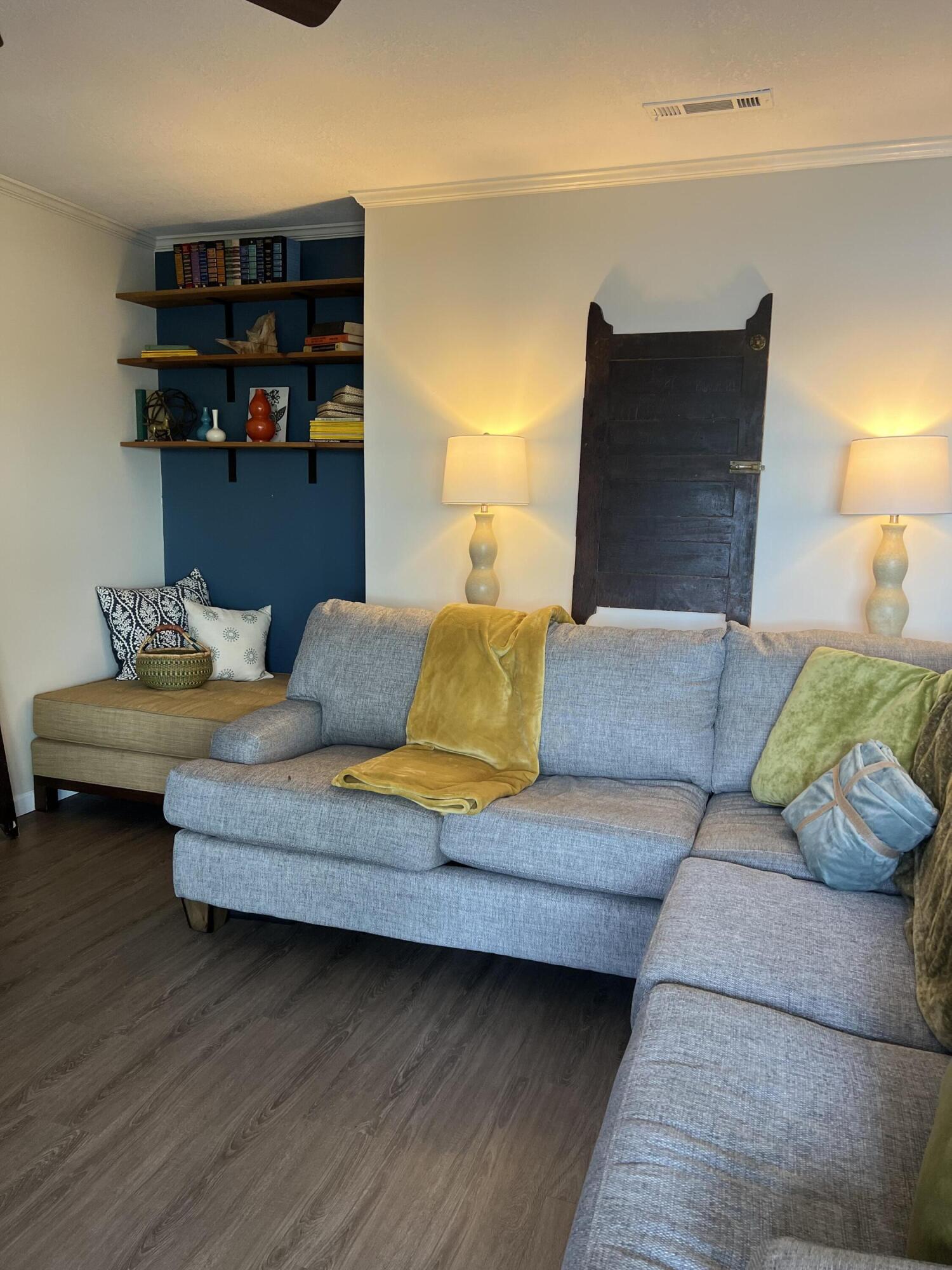 3511 Quail Ridge Drive Chipley, FL 32428 - Photo 4 of 11 a living room with furniture and a wooden floor