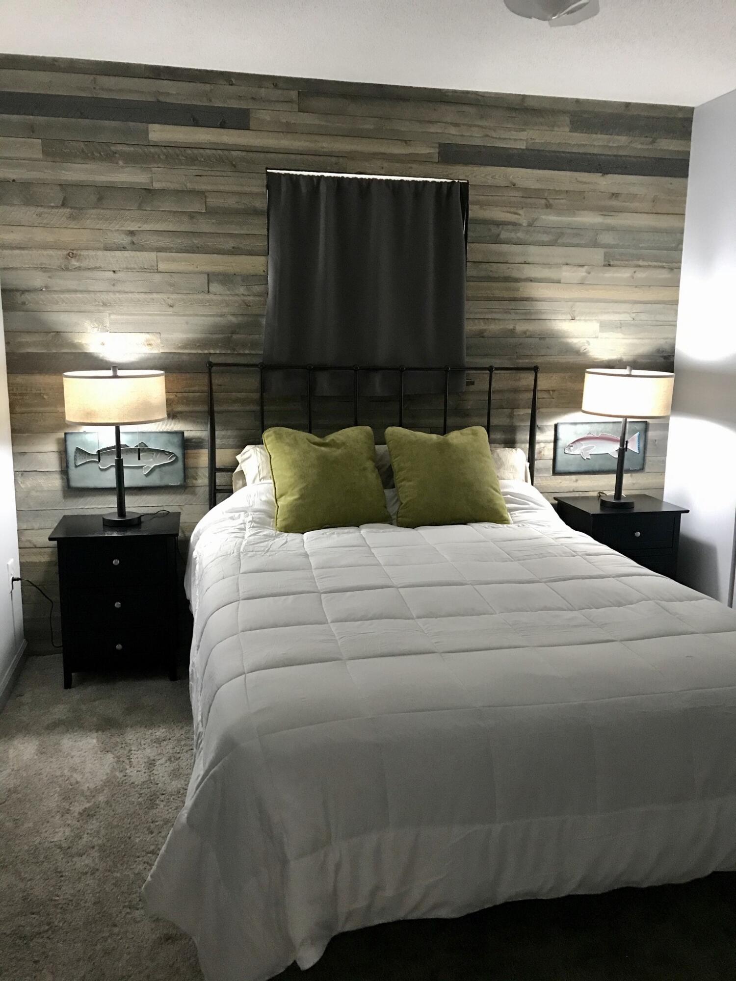 3511 Quail Ridge Drive Chipley, FL 32428 - Photo 6 of 11 a bedroom with a bed and a window