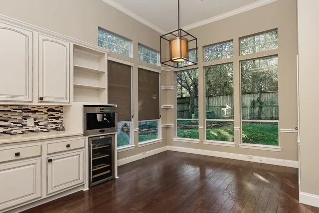 a view of storage and utility room with closet