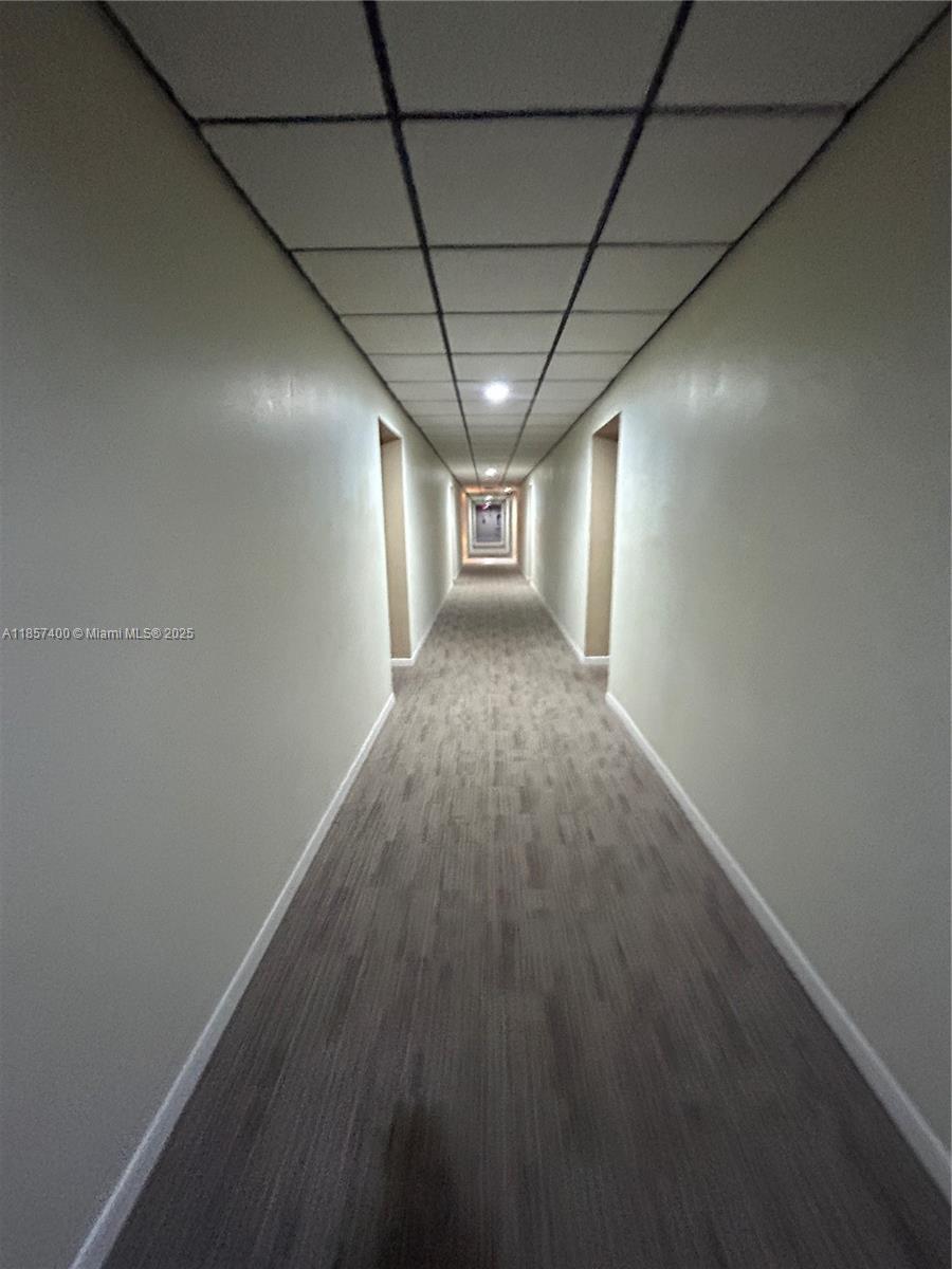 14201 Southwest 66th Street, Unit 306 Miami, FL 33183 - Photo 24 of 38 a view of hallway with stairs