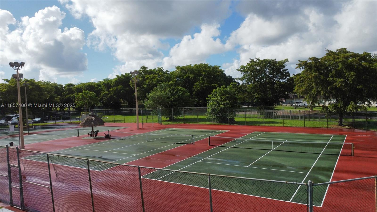 14201 Southwest 66th Street, Unit 306 Miami, FL 33183 - Photo 38 of 38 a view of tennis court