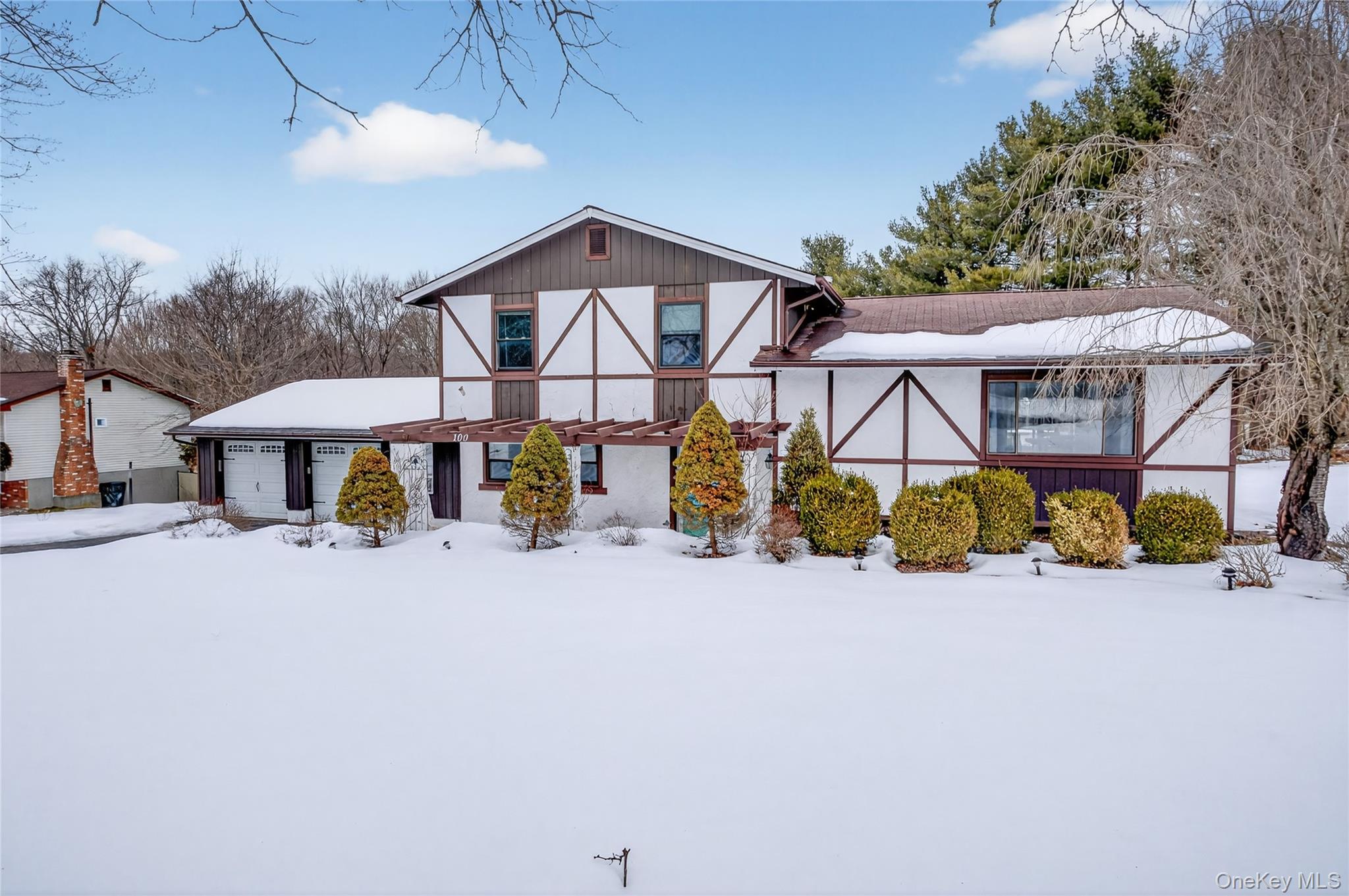 100 Watch Hill Drive Fishkill, NY 12524 - Photo 2 of 49 home featuring an attached garage