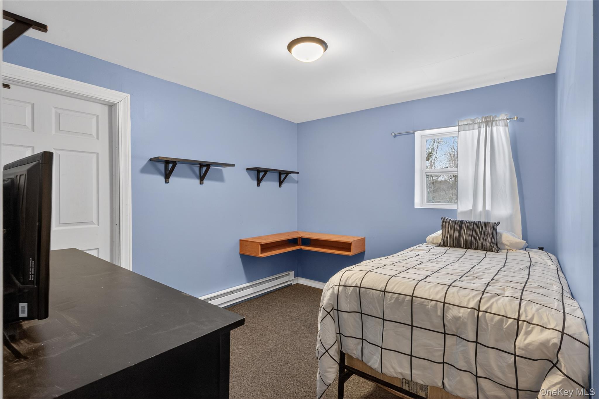 100 Watch Hill Drive Fishkill, NY 12524 - Photo 32 of 49 Bedroom featuring dark carpet and baseboard heating