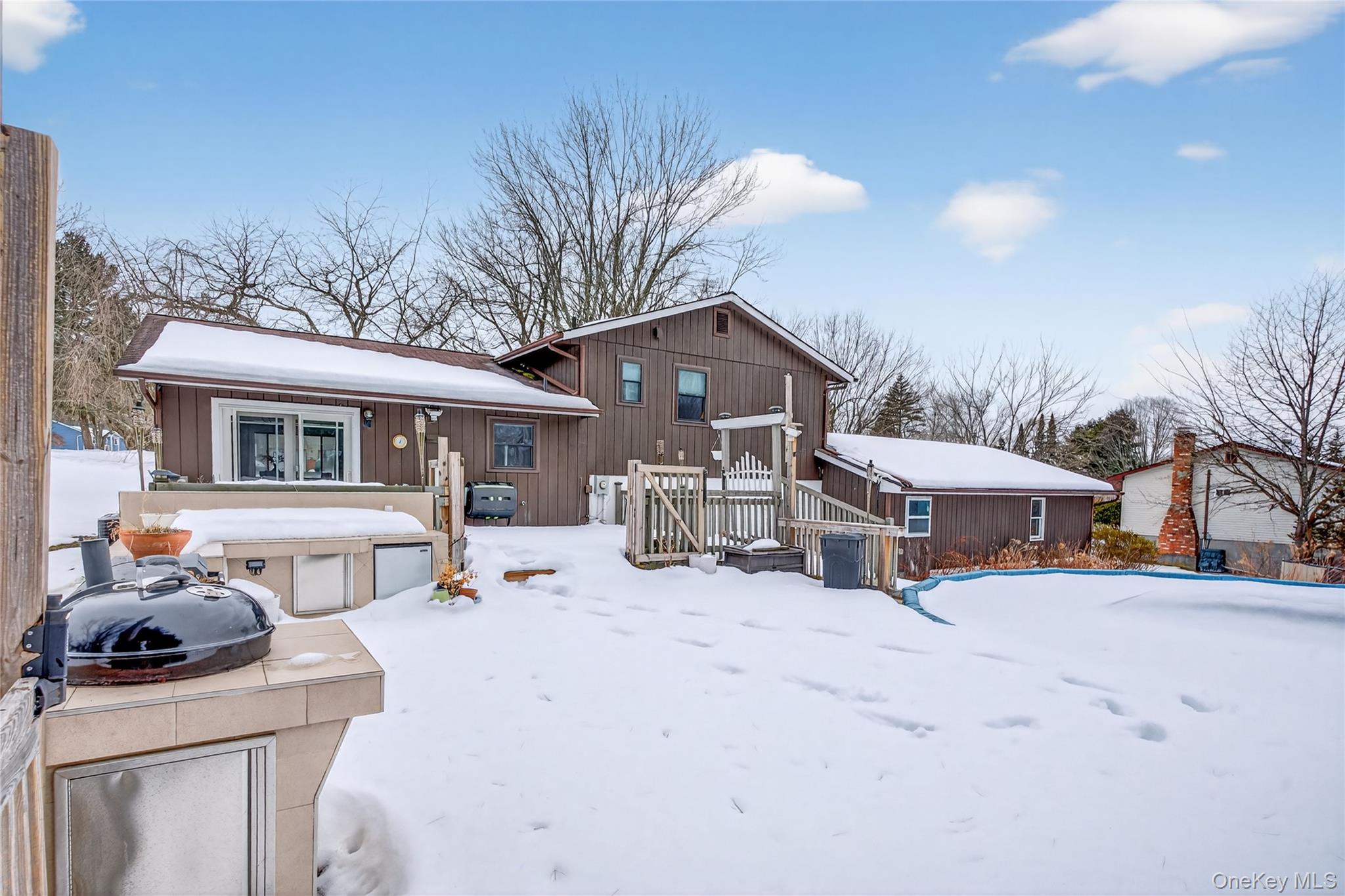 100 Watch Hill Drive Fishkill, NY 12524 - Photo 36 of 49 View of front of house with a deck and board and batten siding