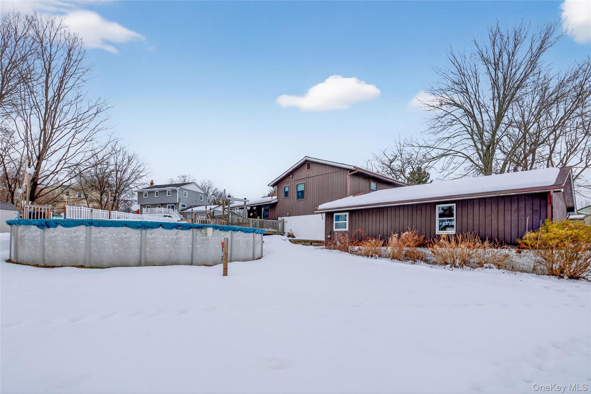 100 Watch Hill Drive Fishkill, NY 12524 - Photo 40 of 49 View of snow covered exterior featuring a covered pool
