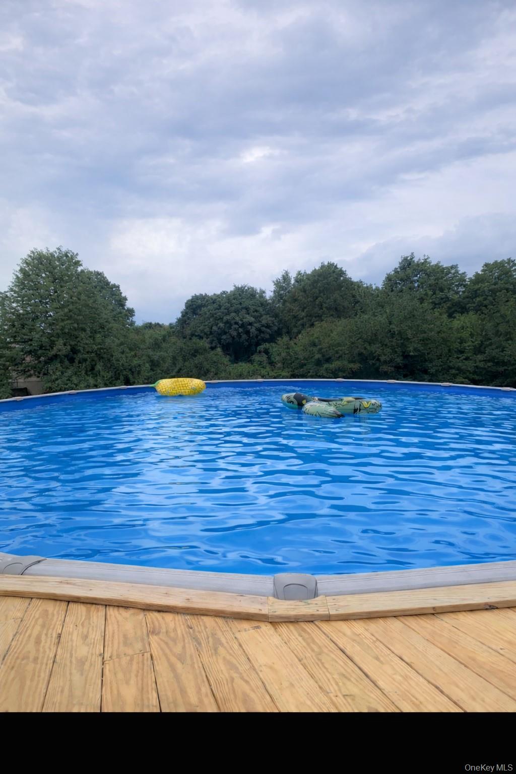 100 Watch Hill Drive Fishkill, NY 12524 - Photo 46 of 49 Deck featuring a pool view