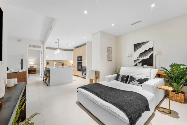 a bedroom with a bed and furniture