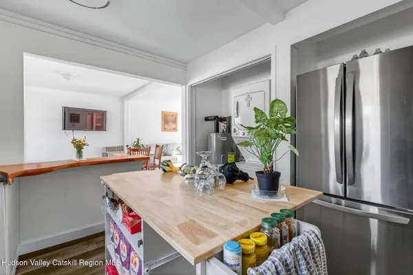 a kitchen with a sink cabinets and window
