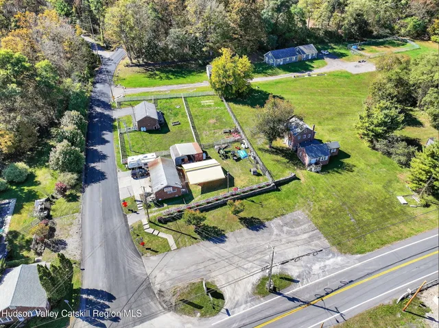 a view of yard with seating area and green space