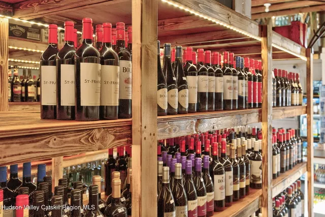 a room with furniture and book shelf