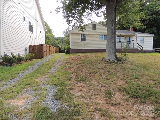 a house view with a backyard space