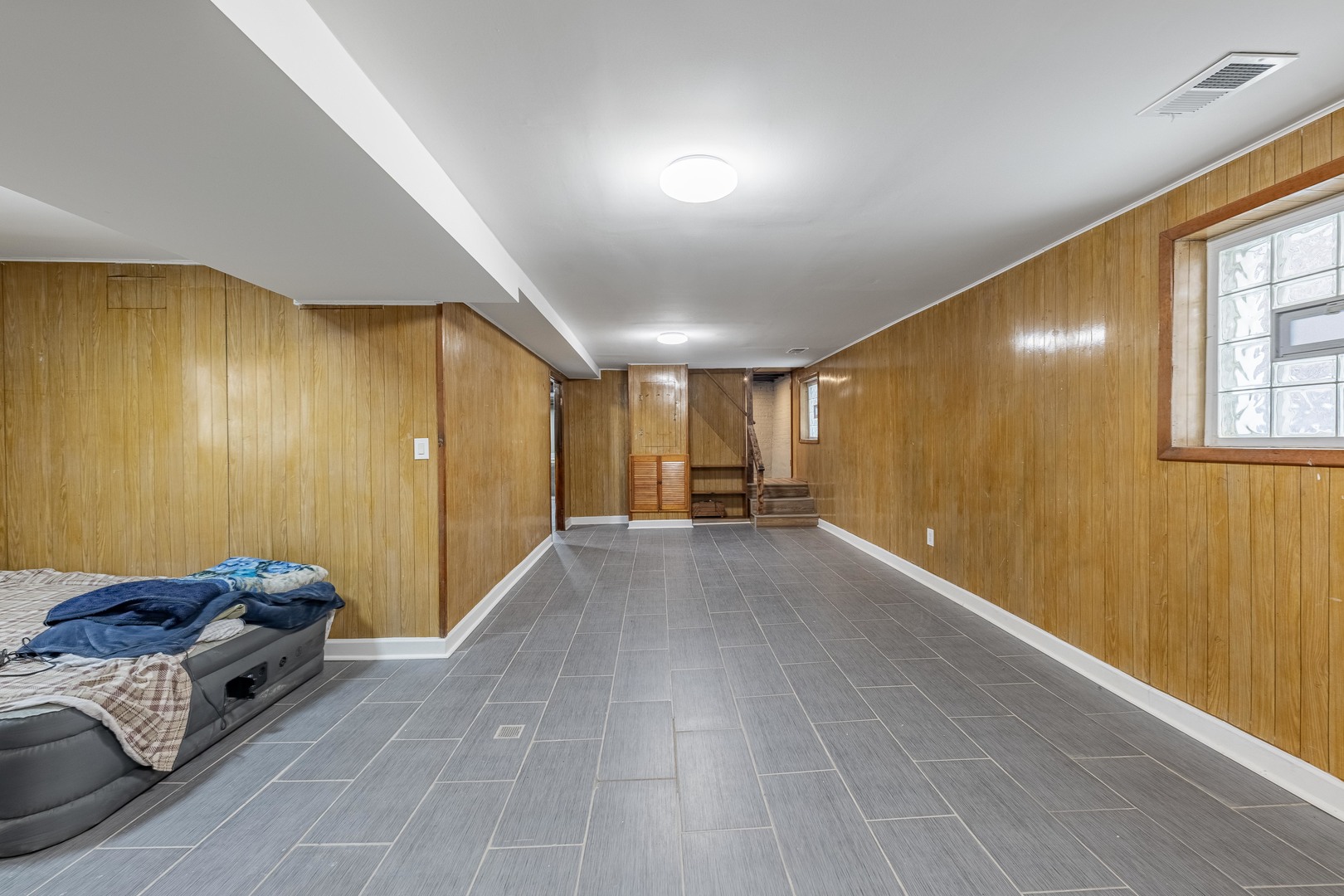 7629 South Green Street Chicago, IL 60620 - Photo 38 of 53 a view of a livingroom with a couch