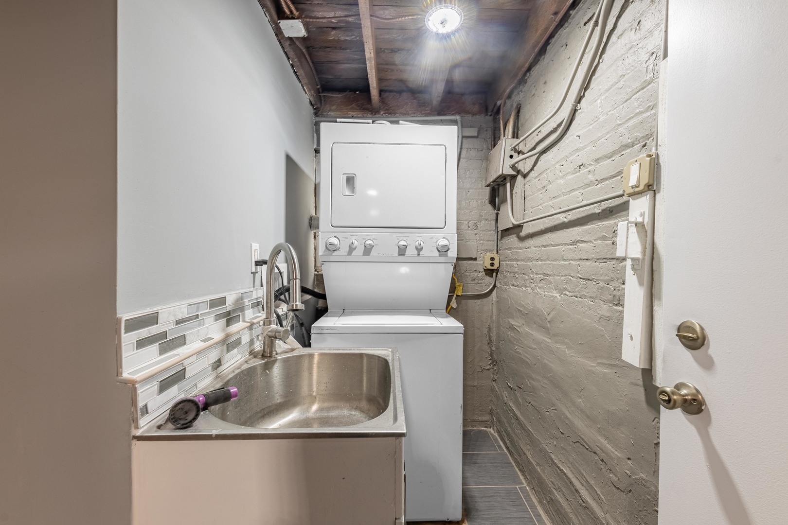 7629 South Green Street Chicago, IL 60620 - Photo 46 of 53 a utility room with dryer and washer