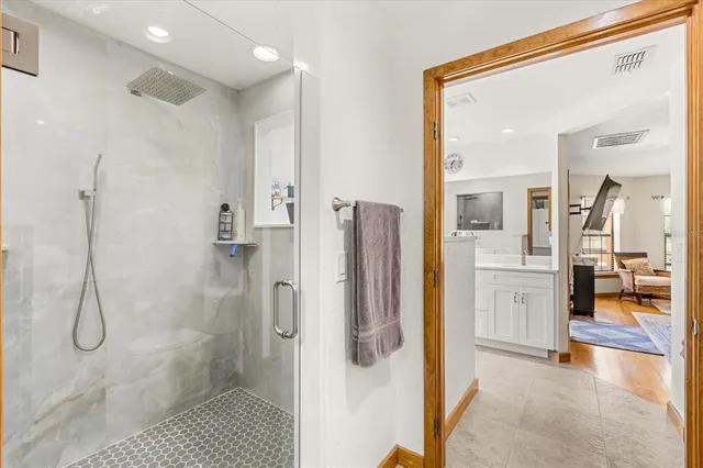 a view of a kitchen counter space and cabinets