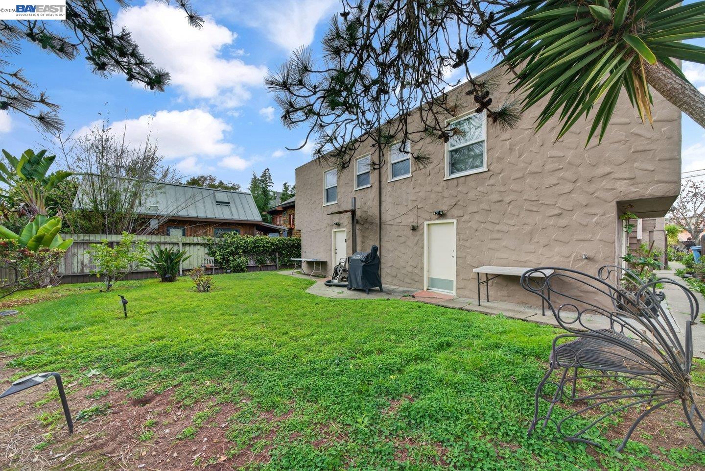 940 Delaware Street Berkeley, CA 94710 - Photo 14 of 16 a view of a patio with table and chairs and potted plants