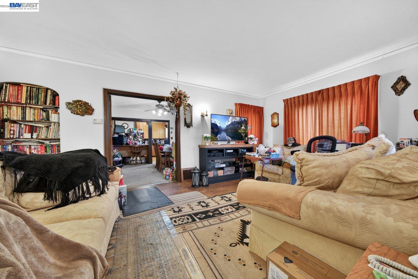 940 Delaware Street Berkeley, CA 94710 - Photo 4 of 16 a living room with furniture window and a couch