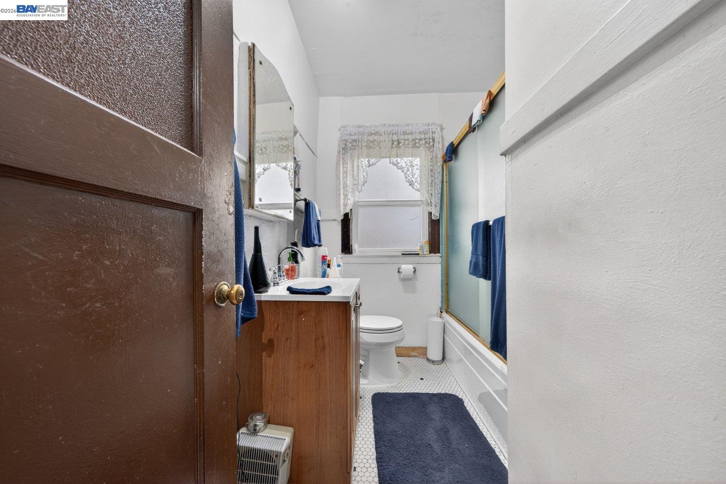 940 Delaware Street Berkeley, CA 94710 - Photo 10 of 16 a view of a kitchen from the hallway