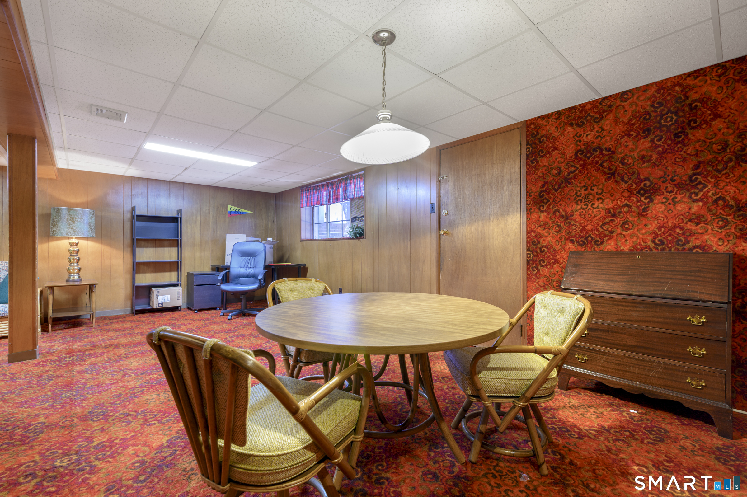 177 Putting Green Road Fairfield, CT 06825 - Photo 16 of 22 Lower level with door to 3 season patio