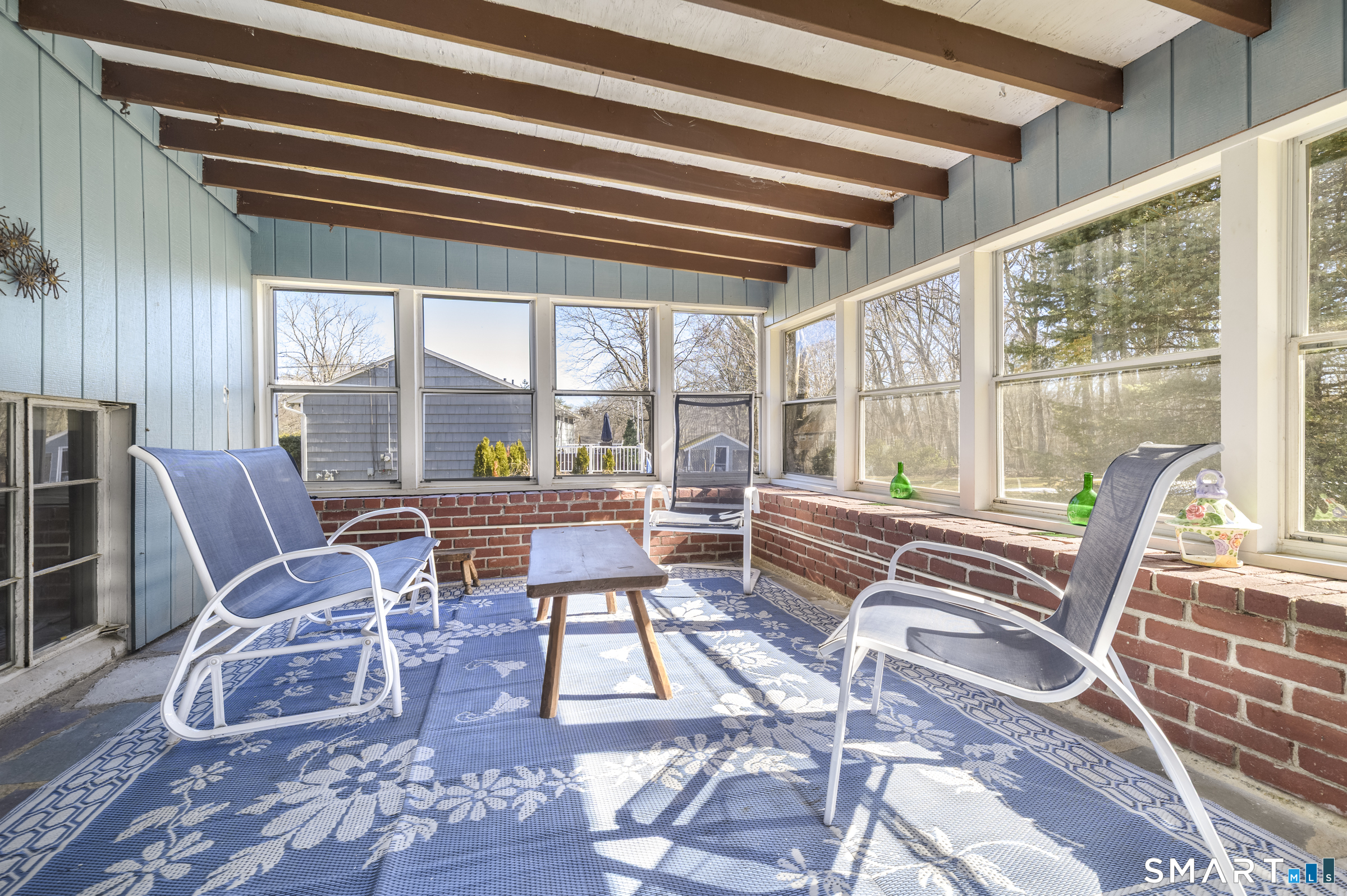 177 Putting Green Road Fairfield, CT 06825 - Photo 17 of 22 Three season patio with entry to lower level