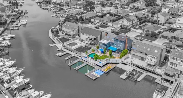 an aerial view of a chairs and table on the wall