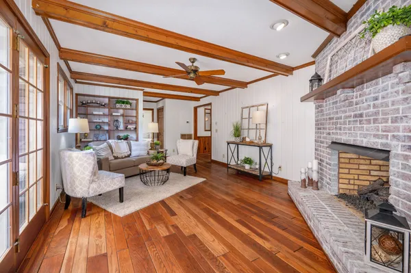 a kitchen with stove and flowers
