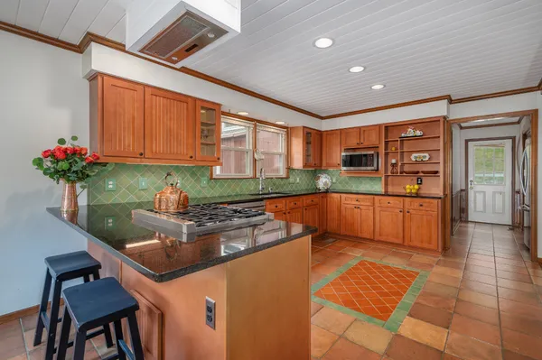 a bathroom with a sink a mirror and a bathtub