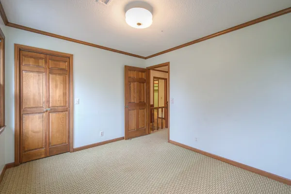 a backyard of a house with outdoor seating