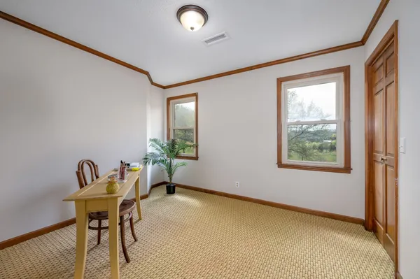 a view of street with a big yard