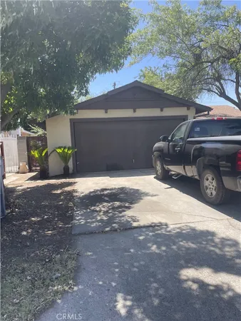 a car parked in front of a house
